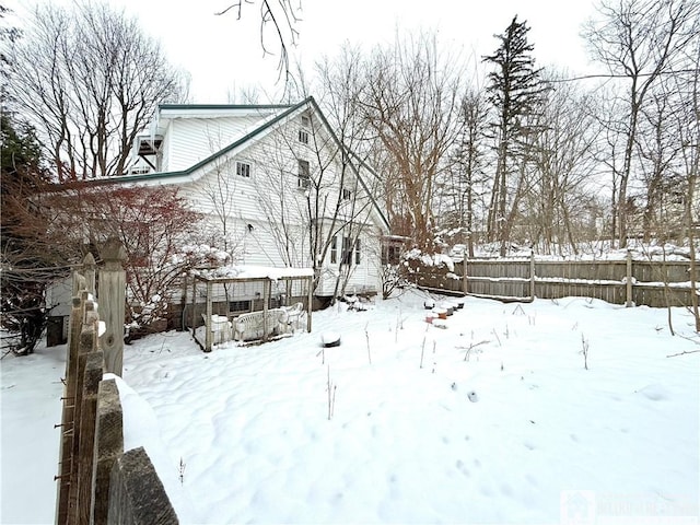 view of yard covered in snow