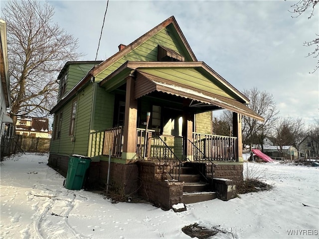 view of front of home featuring covered porch