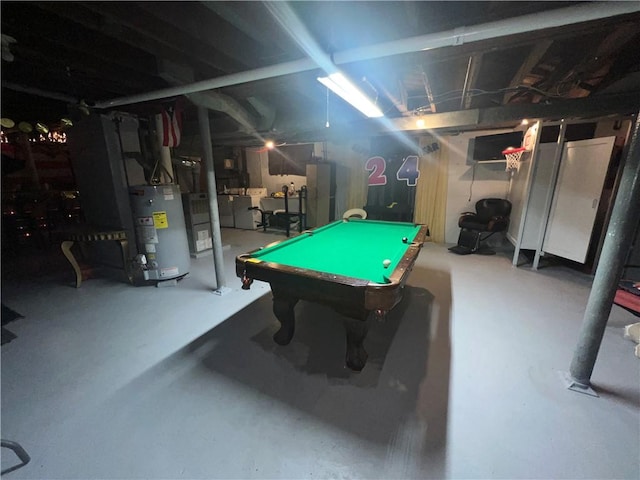 rec room with concrete flooring, billiards, and water heater