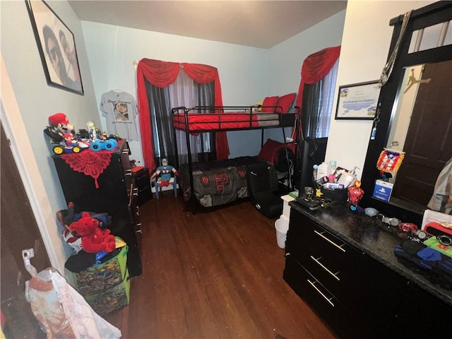 bedroom featuring dark wood-type flooring