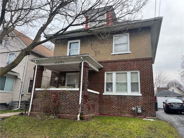 view of front facade featuring a front yard