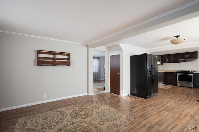 kitchen featuring light wood-type flooring, black refrigerator with ice dispenser, ornamental molding, and stainless steel range oven