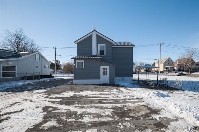 view of snow covered property