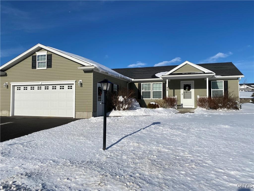 ranch-style house featuring a garage