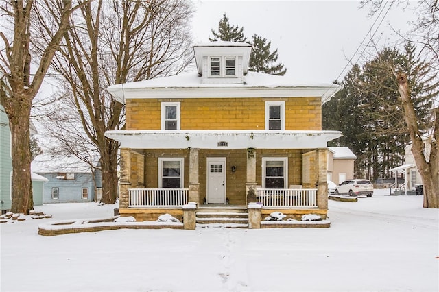 view of front of home featuring covered porch