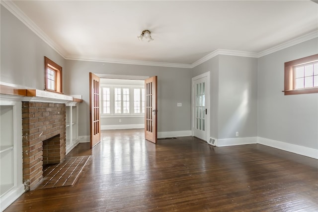 unfurnished living room with a fireplace, dark wood-type flooring, and ornamental molding