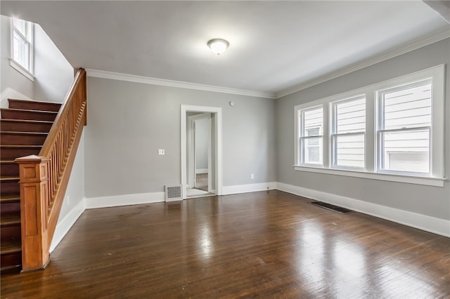 unfurnished living room with dark hardwood / wood-style floors and ornamental molding