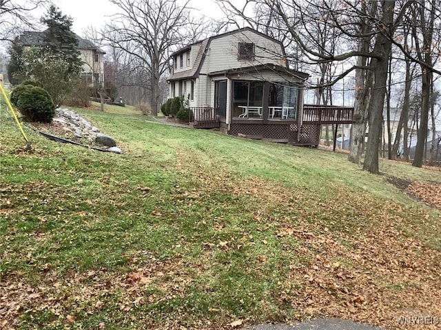 view of yard with a deck