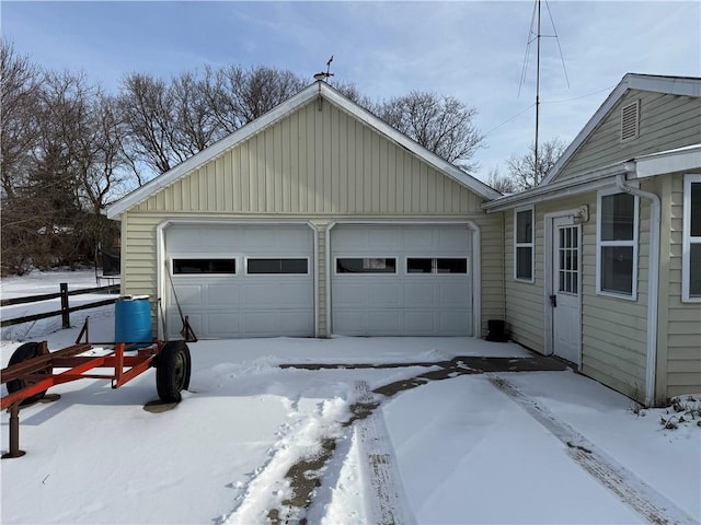 view of snow covered garage