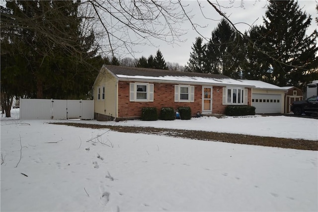 ranch-style house featuring a garage