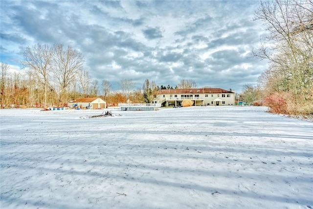 view of yard covered in snow