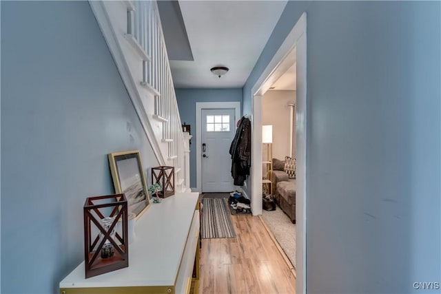 entryway with light wood-type flooring