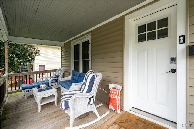 wooden terrace with covered porch