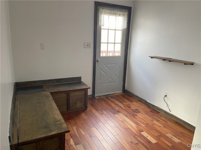 doorway to outside with dark hardwood / wood-style floors