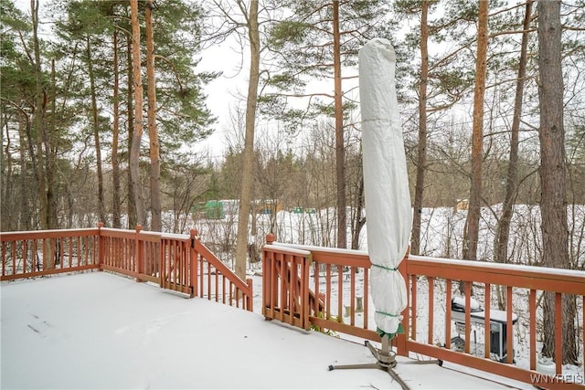 view of snow covered deck