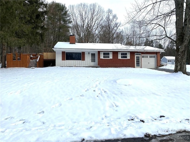 single story home with a garage