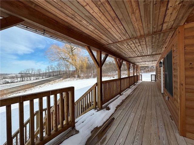 view of snow covered deck