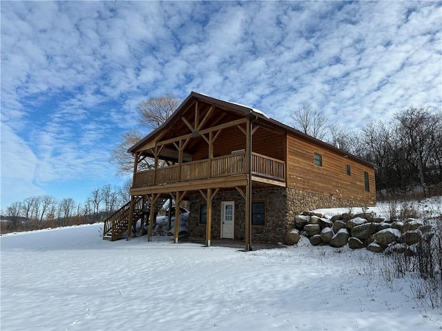 exterior space featuring a wooden deck