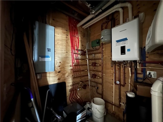 utilities featuring electric water heater and tankless water heater