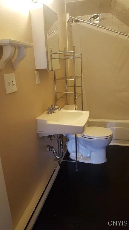 bathroom with toilet and sink