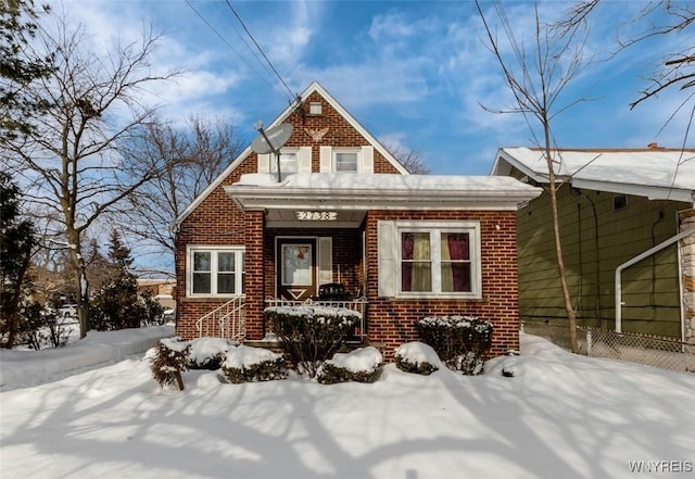 view of front of home featuring covered porch