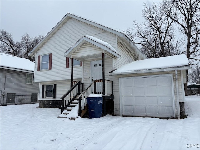 view of front of property with a garage