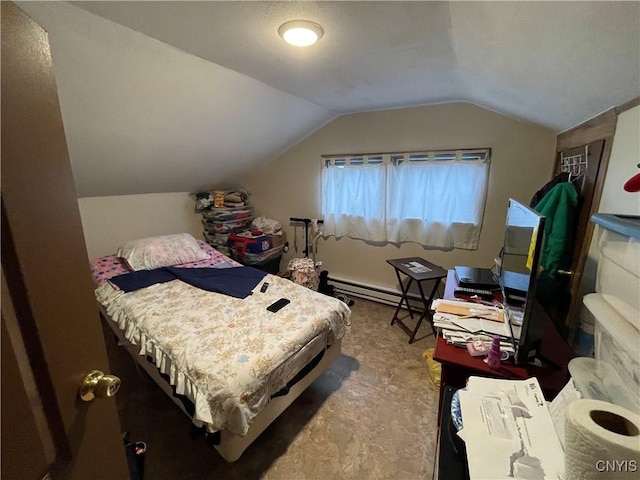 bedroom featuring vaulted ceiling and a baseboard heating unit