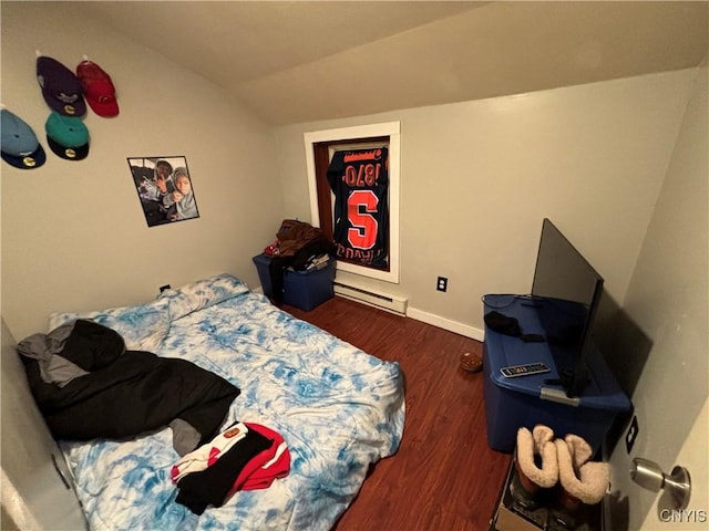 bedroom with dark hardwood / wood-style flooring, a baseboard radiator, and vaulted ceiling