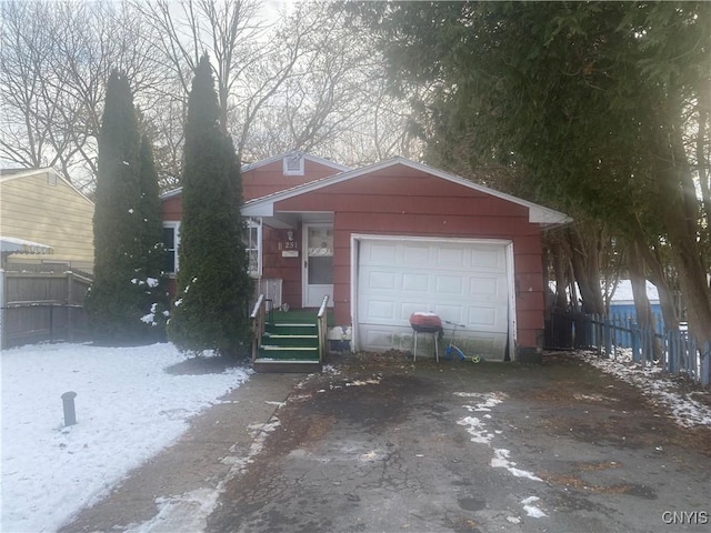 view of front of property featuring a garage