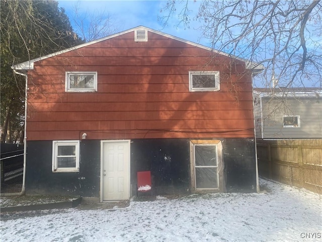 view of snow covered house