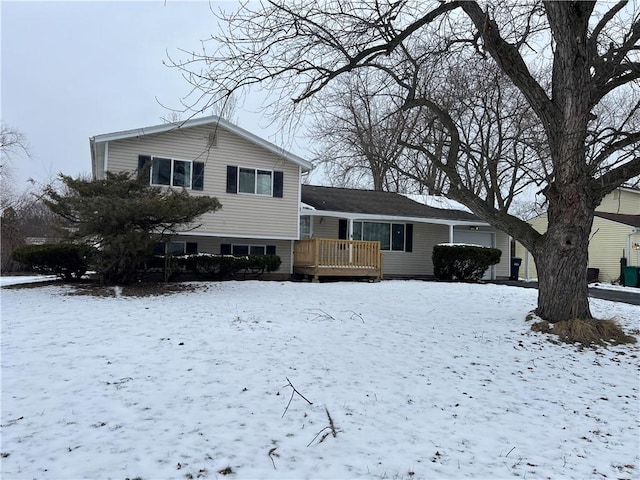 split level home with a wooden deck