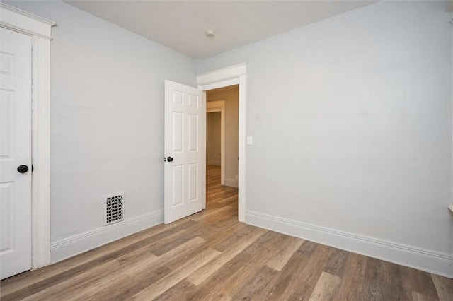 unfurnished bedroom with light hardwood / wood-style floors