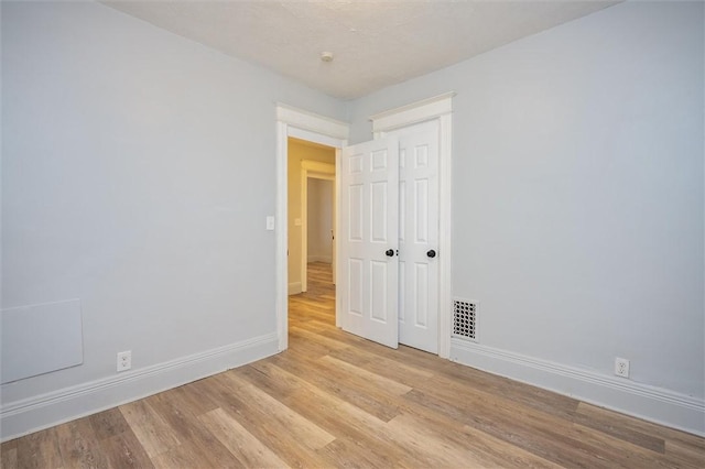 empty room featuring light wood-type flooring