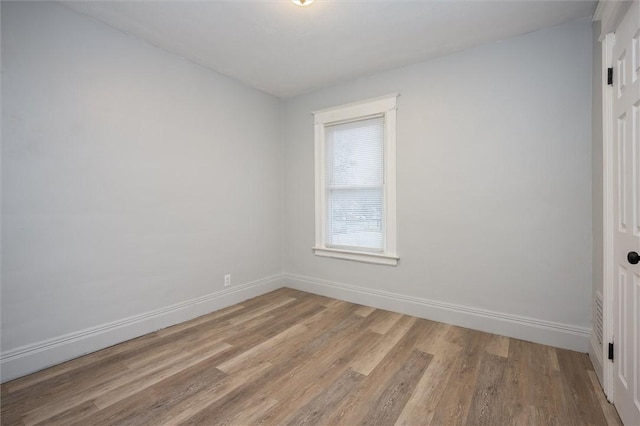 empty room featuring light hardwood / wood-style floors