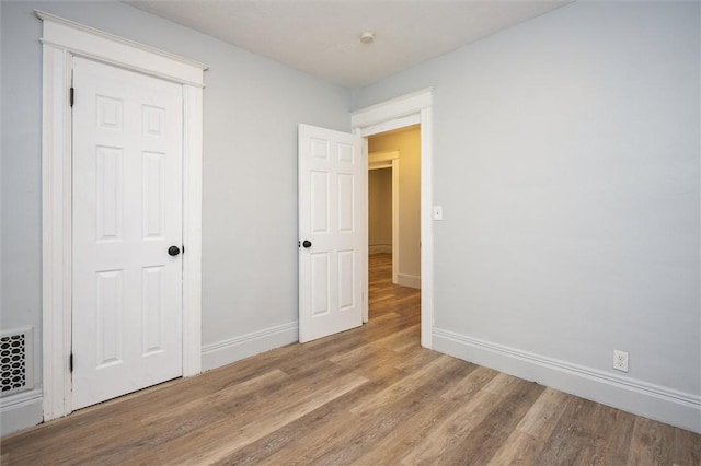 interior space with hardwood / wood-style flooring