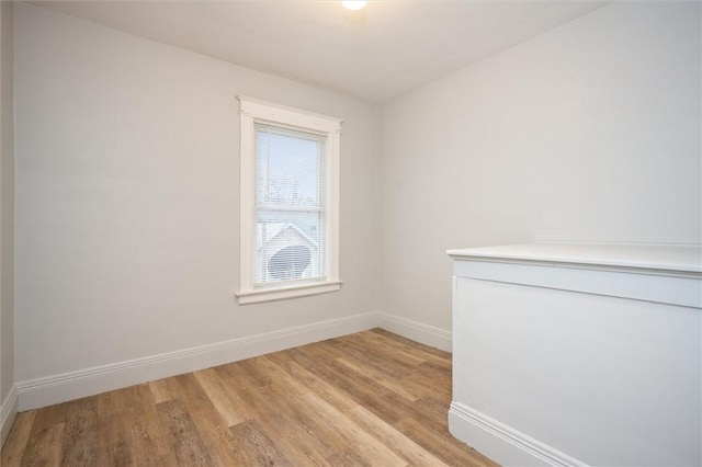 unfurnished room featuring light hardwood / wood-style flooring