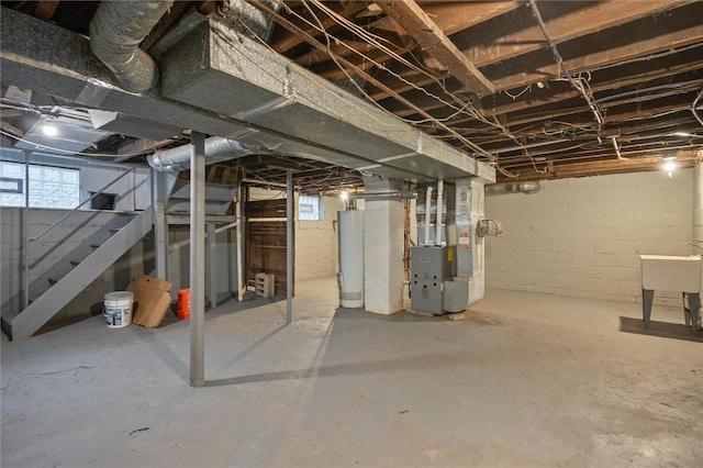 basement with heating unit and gas water heater