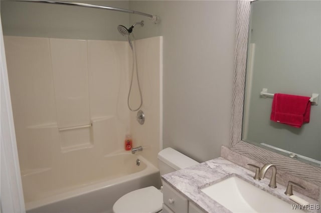 full bathroom with vanity, toilet, and shower / washtub combination