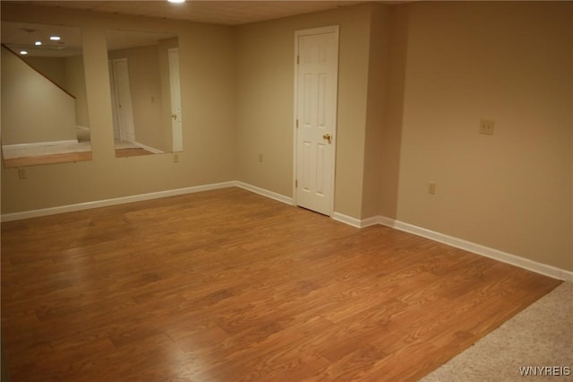 unfurnished room featuring wood-type flooring