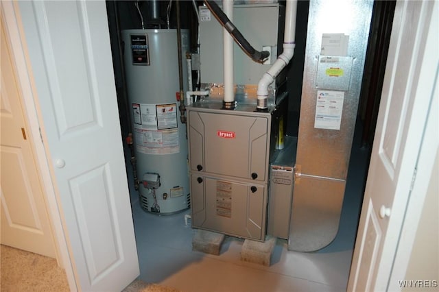 utility room featuring gas water heater