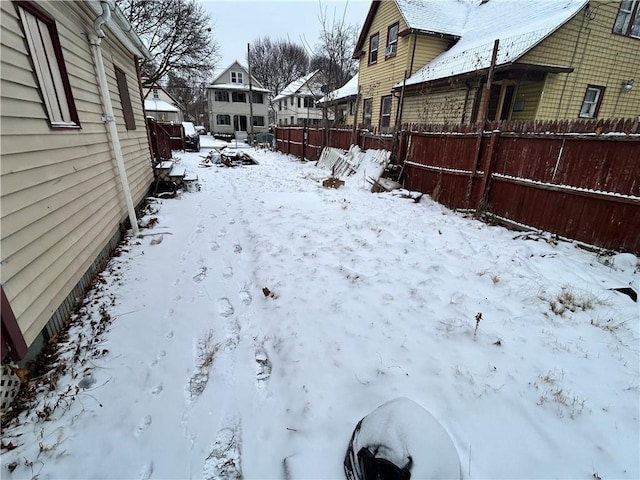 view of yard covered in snow