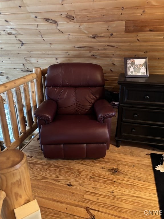 living area with light hardwood / wood-style flooring