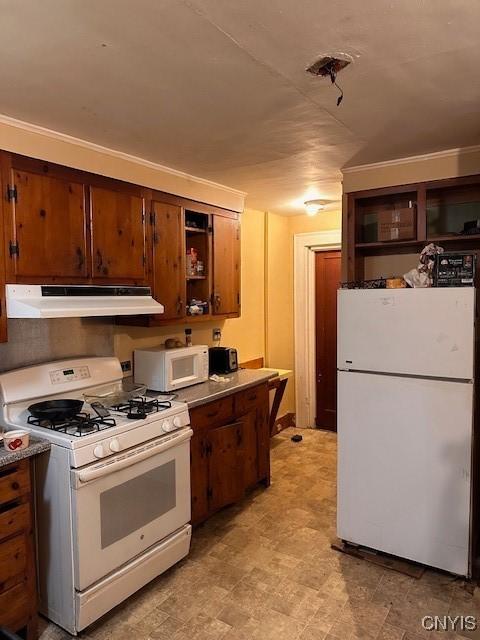 kitchen featuring white appliances, under cabinet range hood, and open shelves