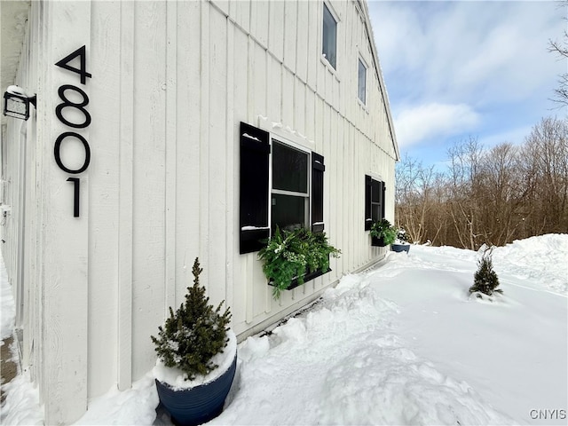 view of snow covered property