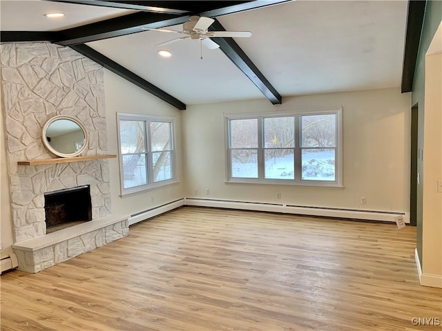 unfurnished living room with ceiling fan, vaulted ceiling with beams, a fireplace, and light wood-type flooring