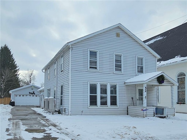 view of front of home featuring an outbuilding and a garage