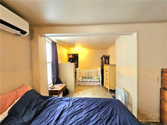 carpeted bedroom featuring a wall mounted AC