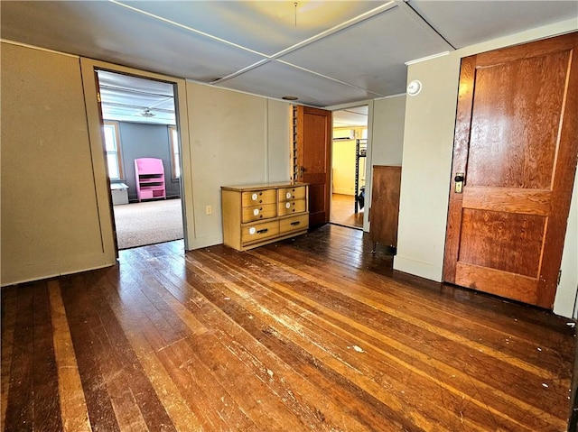 empty room featuring dark wood-type flooring