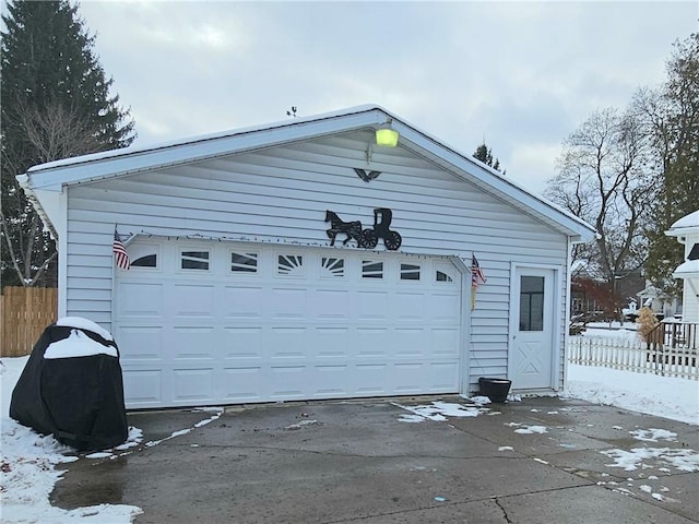 view of snow covered garage