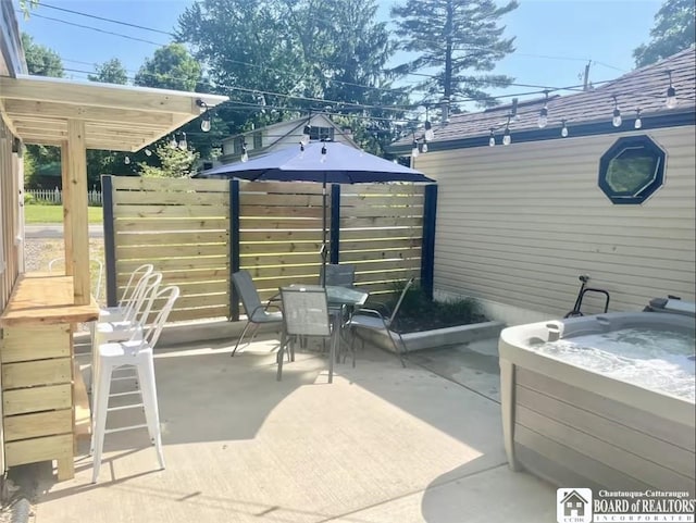 view of patio featuring a hot tub